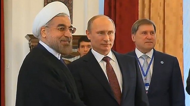 الرئيس الروسي فلاديمير بوتين مع نظيره الايراني حسن روحاني في موسكو 13 سبتمبر 2013 (من شاشة اليوتوب)