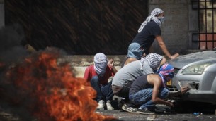 اشتباكات بين فلسطينيين وقوات الشرطة الاسرائيلية في شعفاط بعد العثور على جثة الشاب الفلسطيني المقتول July 2, 2014 (  FLASH90)