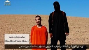 Screenshot from video ostensibly showing the beheading of David Haines
