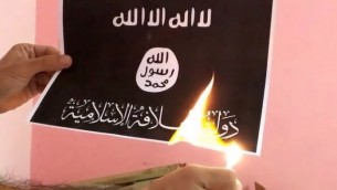 The 'Burn ISIS Flag Challenge' (photo credit: YouTube screenshot)