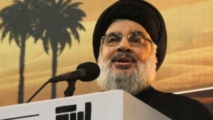 حسن نصر الله يتحدث في ظهور علني نادر امام الآلاف من أنصاره بمناسبة يوم عاشوراء 3 نوفمبر عام 2014، في الضاحية الجنوبية للعاصمة اللبنانية  AFP PHOTO/STR