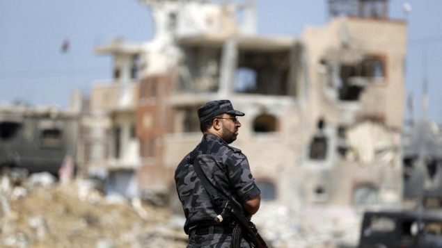 ضابط امن فلسطيني من حماس في غزة، 9 اكتوبر 2014 (AFP/Mohammed Abed)