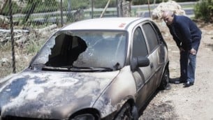 صورة توضيحية لسيارة حرقت بهجوم "تدفيع ثمن" ضد فلسطينيين يونيو 2013 (فلاش 90)