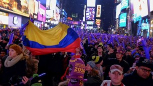 احتفالات عيد رأس السنة في ساحة تايمز سكوير في نيويورك، 31 ديسمبر 2015 (Eduardo Munoz Alvarez/Getty Images/AFP)