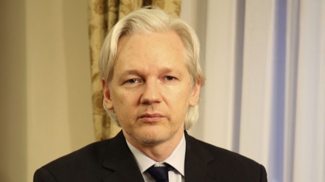 In this July 30, 2013 file photo released by Sunshine Press Productions, WikiLeaks founder Julian Assange sits inside the Ecuadorian Embassy in London. AP/Sunshine Press Productions, File