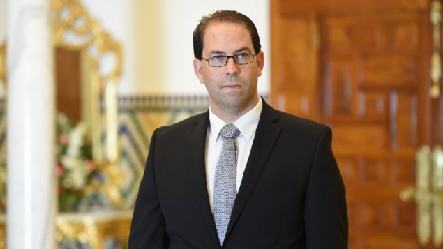 يوسف الشاهد، أصغر سياسي يُكلف ترؤس حكومة في تاريخ تونس منذ استقلالها عن فرنسا، في قصر قرطاج، تونس، 3 اغسطس 2016 (FETHI BELAID / AFP)
