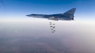A Russian long range bomber Tu-22M3 flies during a strike above an undisclosed location in Syria on Sunday, Aug. 14, 2015. ( Russian Defense Ministry press service photo via AP)