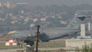 A United States Air Force cargo plane maneuvers on the runway after it landed at the Incirlik Air Base, in Adana, southern Turkey, Sunday, Aug. 9, 2015. AP Photo
