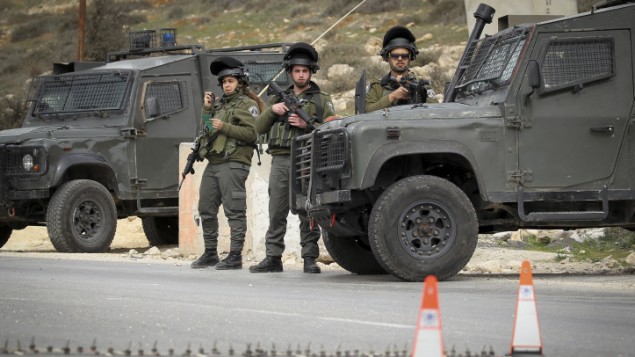 Israeli border police officers guard at a checkpoint in the West Bank village of Bani Na'im, East of Hebron on January 26, 2017. Photo by Wisam Hashlamoun/Flash90 *** Local Caption *** ?????
?????
???
?????
???
?????