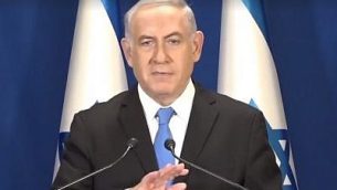 رئيس الوزراء بينيامين نتنياهو يرد على توصيات الشرطة في تقديمه للمحاكمة في شبهات تلقي الرشوة في تحقيقي جنائيين ضده، 13 فبراير، 2018. (لقطة شاشة: Facebook)