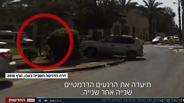 في هذه الصورة المأخوذة من مقطع فيديو، بالإمكان رؤية مالك أسدي وهو يقود مركبته باتجاه جندي في ما يُشتبه بأنه هجوم دهس وقع في مدينة عكا شمالي إسرائيل في 4 مارس، 2018. (Screen capture: Hadashot news)