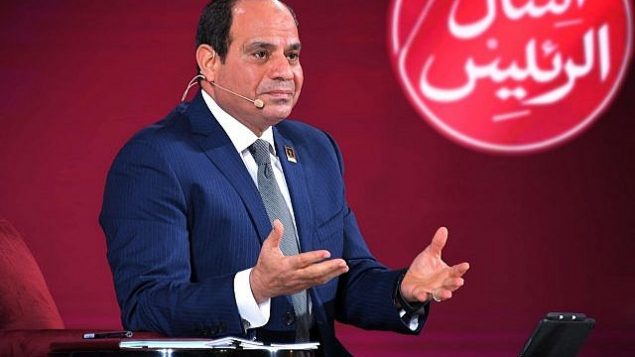 في هذه الصورة التي قدمتها وكالة الأنباء المصرية "مينا" (الشرق الأوسط وشمال أفريقيا)، الرئيس المصري عبد الفتاح السيسي يتحدث خلال مؤتمر للشباب في القاهرة، مصر، 29 يوليو، 2018. (MENA via AP)