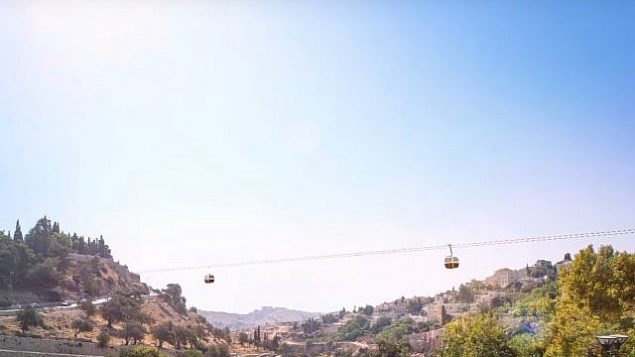 تصور فني لمشروع عربات التلفريك التي تمر فوق وادي ’هينوم’، من فيديو ترويجي تم نشره على YouTube. تصور فني لمشروع عربات التلفريك التي تمر فوق وادي ’هينوم’، من فيديو ترويجي تم نشره على YouTube.