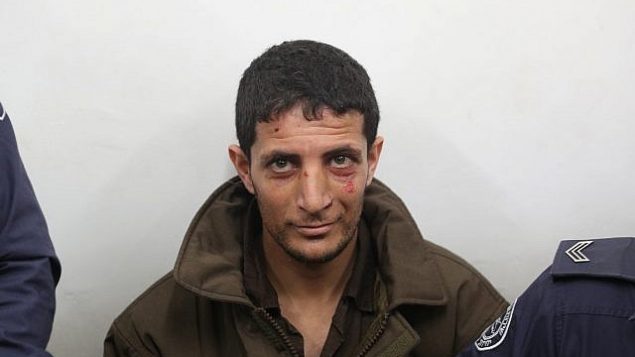 عرفات ارفاعية، المتهم بقتل الفتاة الإسرائيلي أوري أنسباخر (19 عاما)، يمثل أمام محكمة الصلح في القدس، 11 فبراير، 2019.  (Yonatan Sindel/Flash90)
