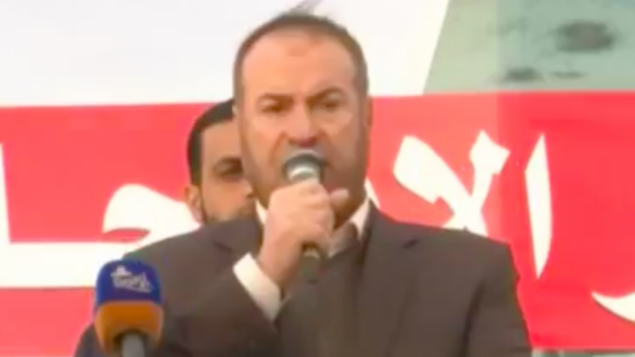 فتحي حماس، مسؤول كبير في حركة حماس، يلقي خطابا في المنطقة الحدودية بين إسرائيل وقطاع غزة، 19 فبراير، 2019. (Screenshot: Al-Aqsa TV) فتحي حماس، مسؤول كبير في حركة حماس، يلقي خطابا في المنطقة الحدودية بين إسرائيل وقطاع غزة، 19 فبراير، 2019. (Screenshot: Al-Aqsa TV)