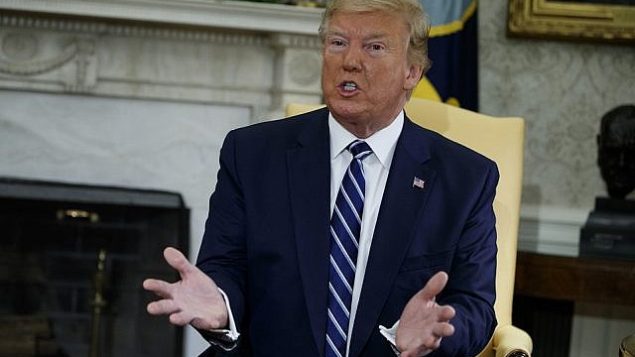 الرئيس الأمريكي دونالد ترامب يتكلم خلال لقاء برئيس الوزراء الكندي جاستين ترودو في البيت الأبيض بواشنطن، الخميس، 20 يونيو، 2019. (AP/Evan Vucci)