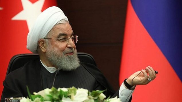 الرئيس الإيراني حسن روحاني يتحدث خلال مؤتمر صحفي مشترك مع نظيريه الروسي والتركي بعد اجتماع ثلاثي لمناقشة الشأن السوري في أنقرة، 16 سبتمبر، 2019.  (Adem Altan/AFP)