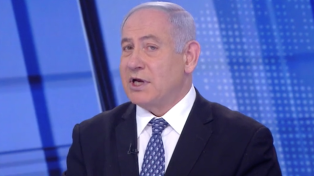 رئيس الوزراء بنيامين نتنياهو في مقابلة مع القناة 12 في 21 مارس، 2020. (Screenshot)