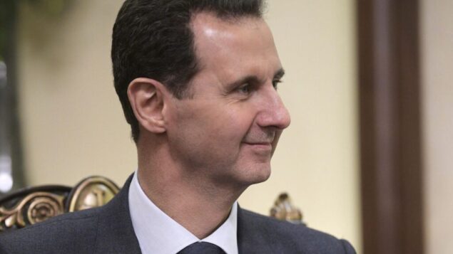 الرئيس السوري بشار الأسد يستمع إلى الرئيس الروسي فلاديمير بوتين خلال لقائهما في دمشق، سوريا، 7 يناير 2020. (Alexei Druzhinin / Sputnik، Kremlin Pool Photo via AP)