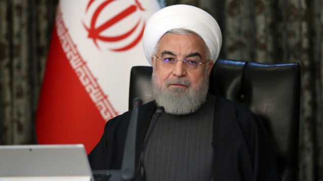 الرئيس الإيراني حسن روحاني يحضر جلسة مجلس الوزراء في طهران، إيران، 18 مارس 2020. (Office of the Iranian Presidency via AP)