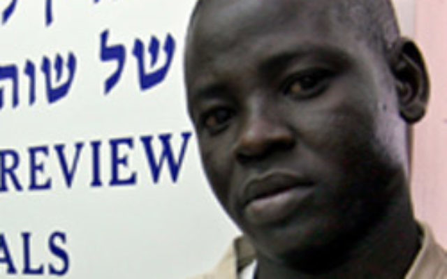 A Sudanese youth who lost his family in the Darfur fighting seeks refuge in Israel. Photo: JTA/AJN file