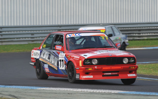 Levy drives to victory in his BMW.