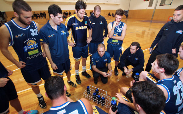 Coach Andrew
Solewicz addresses
his charges earlier this
season. Photo: Peter
Haskin