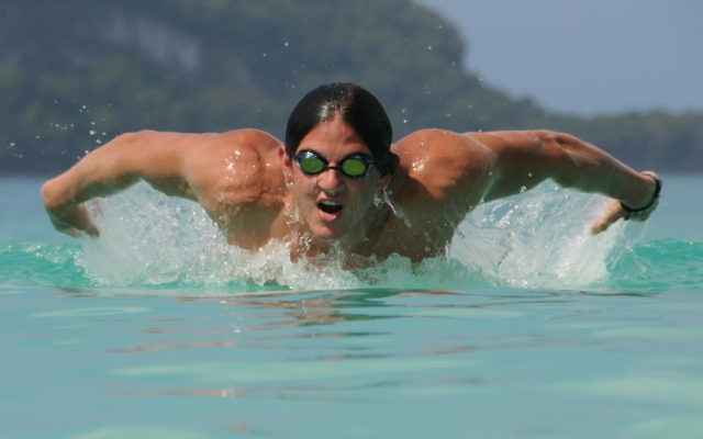 Kyron Israelsohn powers through the pool.