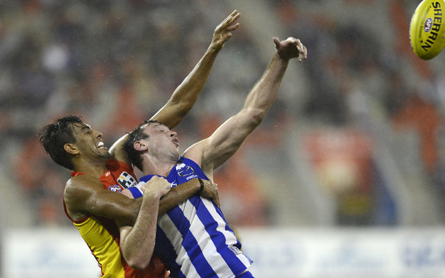 Todd Goldstein (right) holds off Gold Coast Suns Tom Nicholls at Metricon Stadium earlier this year. Photo: AAP Image/Dan Peled Todd Goldstein (right) holds off Gold Coast Suns Tom Nicholls at Metricon Stadium earlier this year. Photo: AAP Image/Dan Peled