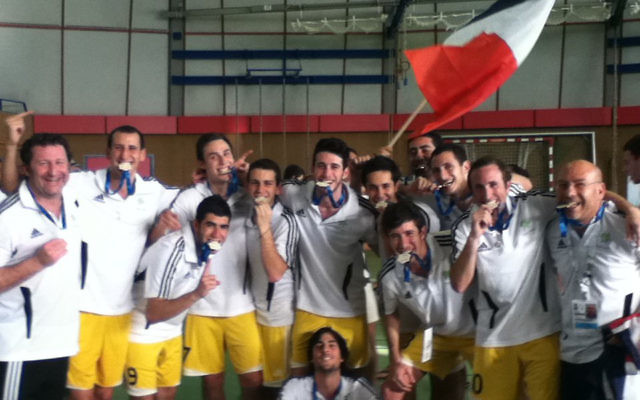 The Australian futsal team celebrates gold at the 2011 EMG. The Australian futsal team celebrates gold at the 2011 EMG.