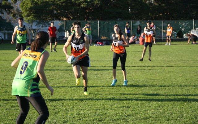 Evan Kassel on the attack for the Tigers, with Bec Lissing in support. Photo: Sam Contori