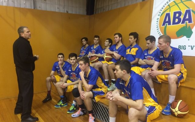 Coach Al Westover addresses the Maccabi Warriors youth team. Coach Al Westover addresses the Maccabi Warriors youth team.