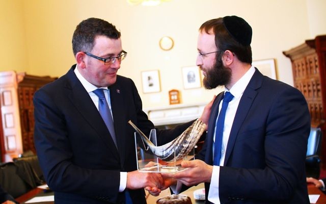 Premier Daniel Andrews (left) is presented with a shofar from RCV vice president Rabbi Daniel Rabin. Photo: Peter Haskin Premier Daniel Andrews (left) is presented with a shofar from RCV vice president Rabbi Daniel Rabin. Photo: Peter Haskin