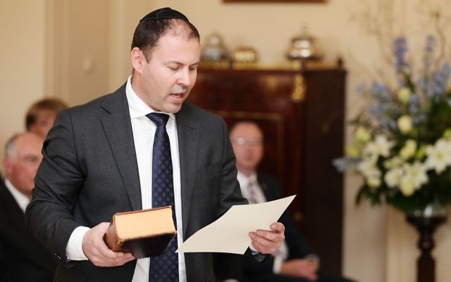 Josh Frydenberg being sworn in on Monday. Photo: AAP Image/Lukas Coch