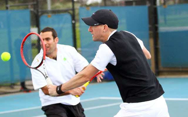 Asaf Drori, in the
foreground, with Asaf
Nagar during the
double win against
Wellington on Saturday.
Photo: Peter Haskin