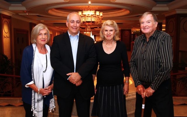 Chemi Peres (second left) with the children of Padre Rex Daker, Gwen Macdougal,
Joan Robinson and John Daker. Photo: Peter Haskin