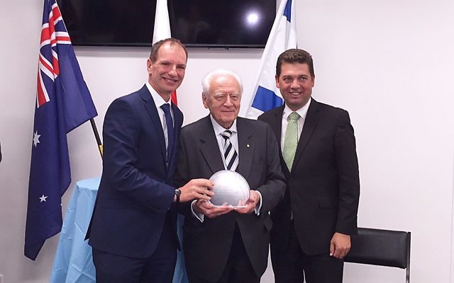 Christopher Lancucki (centre) and his Slawik Award with (l-r) David Southwick and Nick Wakeling. Photo: Peter Kohn