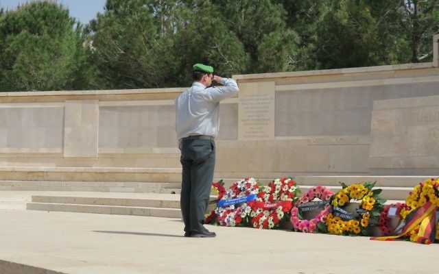 Israel Defence Forces’ Colonel Moshe Pinkert laying a wreath at the ceremony in Jerusalem.