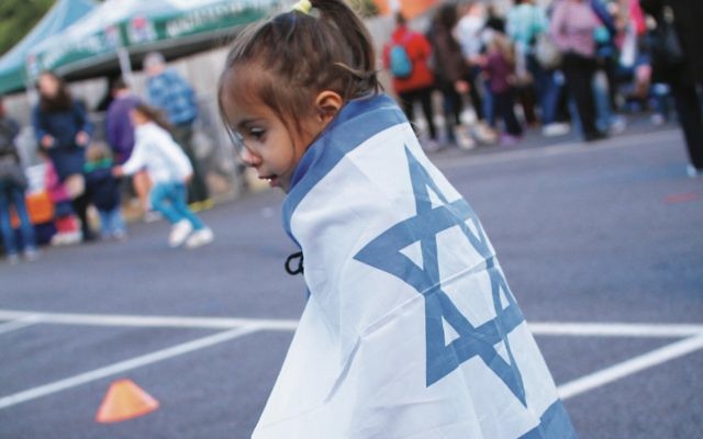 A participant at a previous Yom Ha’atzmaut Family Festival. Photo: Peter Haskin