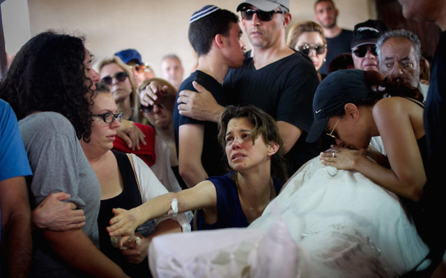 Family and friends mourning at the funeral ceremony of Ido Ben Ari.
Photo: Miriam Alster/Flash90/JTA. Family and friends mourning at the funeral ceremony of Ido Ben Ari.
Photo: Miriam Alster/Flash90/JTA.