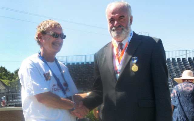 Peter Allen with Lambis Englezos at the ceremony in Fromelles, France on July 19.