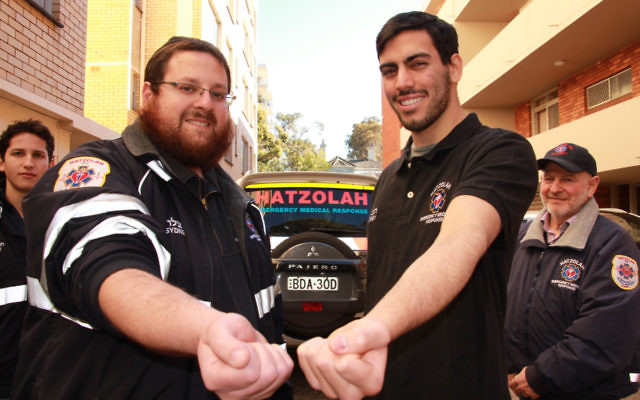 Hatzolah of Sydney president Rabbi Mendy Litzman and volunteer first responder Tzvi Eliezer Berman (centre) are participating in the Emergency Services Blood Challenge this winter, urged on by volunteers Daniel Balkin (left) and Joe Weijnstein (right). Photo: Shane Desiatnik. Hatzolah of Sydney president Rabbi Mendy Litzman and volunteer first responder Tzvi Eliezer Berman (centre) are participating in the Emergency Services Blood Challenge this winter, urged on by volunteers Daniel Balkin (left) and Joe Weijnstein (right). Photo: Shane Desiatnik.