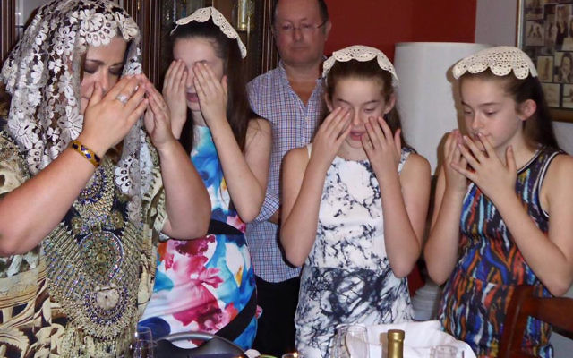 Justine Kuran with her daughters (from left) Marley, Peri and Shaini, and husband Bernie (back). Justine Kuran with her daughters (from left) Marley, Peri and Shaini, and husband Bernie (back).
