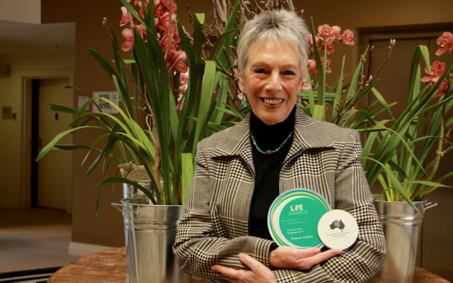 Suicide prevention advocate Dianne Gaddin with her 2016 Suicide Prevention Australia LiFE Award for individual contribution to community engagement. Photo: Shane Desiatnik.