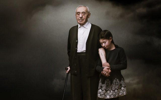 An award-winning photo of Herschel Balter and his granddaughter Tori by Kristian Piccoli.