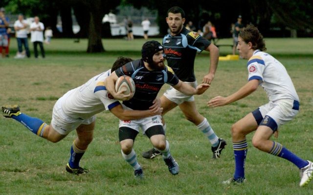 Maccabi first grader Daniel Munitz attempts to fend off the Lane Cove defence in his team’s 48-0 win at Lyne Park on April 22.
Photo: Shane Desiatnik Maccabi first grader Daniel Munitz attempts to fend off the Lane Cove defence in his team’s 48-0 win at Lyne Park on April 22.
Photo: Shane Desiatnik