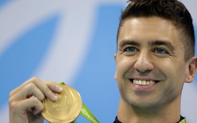 Anthony Ervin with his gold medal at the Olympics. Anthony Ervin with his gold medal at the Olympics.