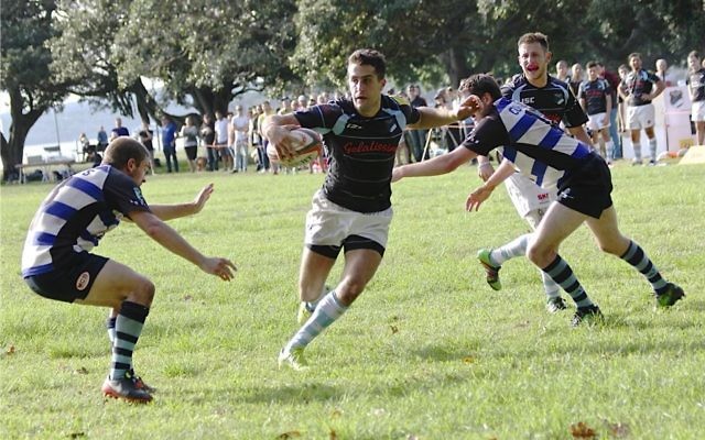 Nathan Ezekial runs through a gap on Saturday. Photo: Tim Wilson