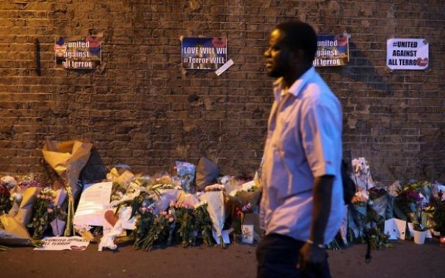 Tributes lain after the attack on pedestrians leaving the Finsbury Park Mosque.