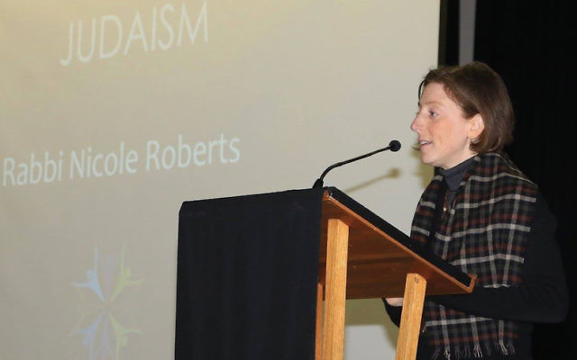 Rabbi Nicole Roberts speaking at the Youth PoWR conference.